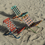 Silla de playa Tucurinca 4200 — tres sillas en la arena en sus tres combinaciones de color