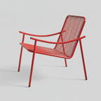 Poltrona Skii X de Tucurinca con estructura roja