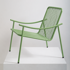 Poltrona Skii X de Tucurinca con estructura verde oliva